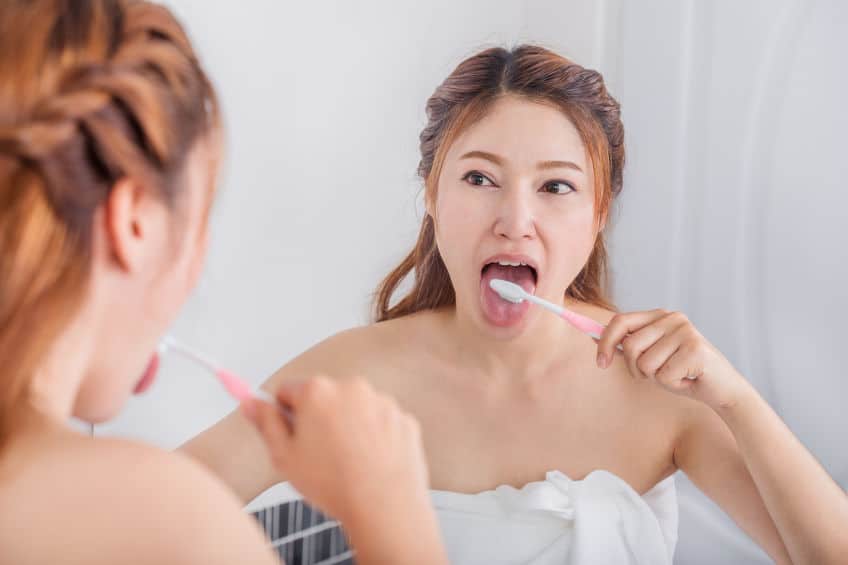 Brushing your tongue…part of good dental hygiene.